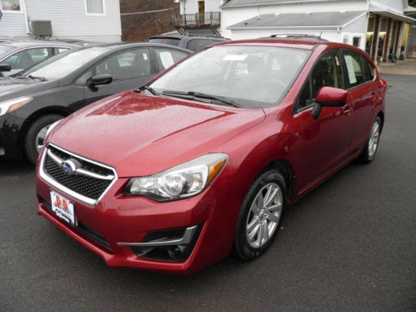 2015 RED SUBARU IMPREZA 2.0i Premium PZEV 5-Door (JF1GPAC62FH) with an 2.0L L4 engine, AT transmission, located at 15520 McMullen Hwy SW, Belair, MD, 21502, (301) 729-3700, 39.581375, -78.846451 - Photo#0