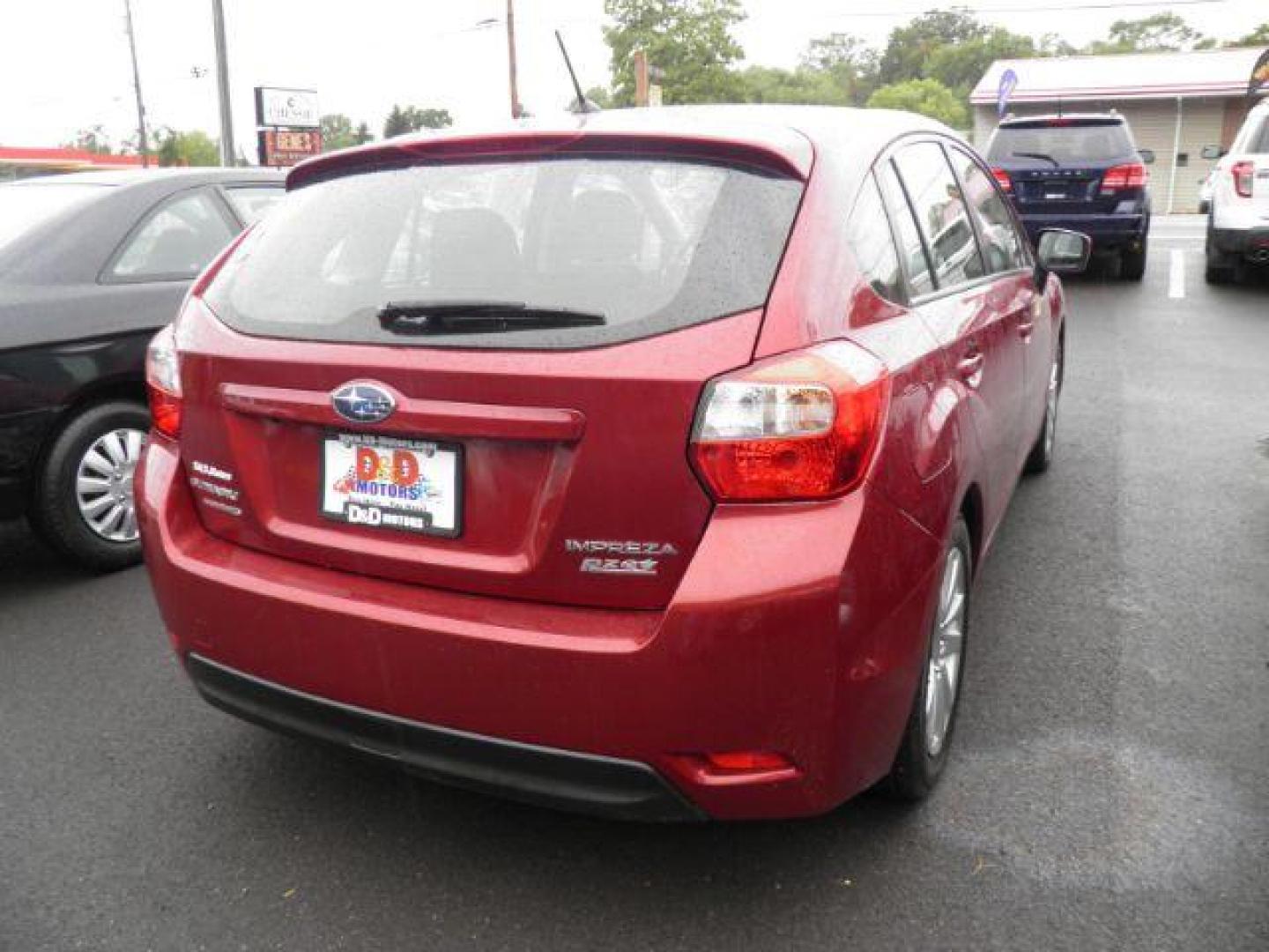 2015 RED SUBARU IMPREZA 2.0i Premium PZEV 5-Door (JF1GPAC62FH) with an 2.0L L4 engine, AT transmission, located at 15520 McMullen Hwy SW, Belair, MD, 21502, (301) 729-3700, 39.581375, -78.846451 - Photo#5