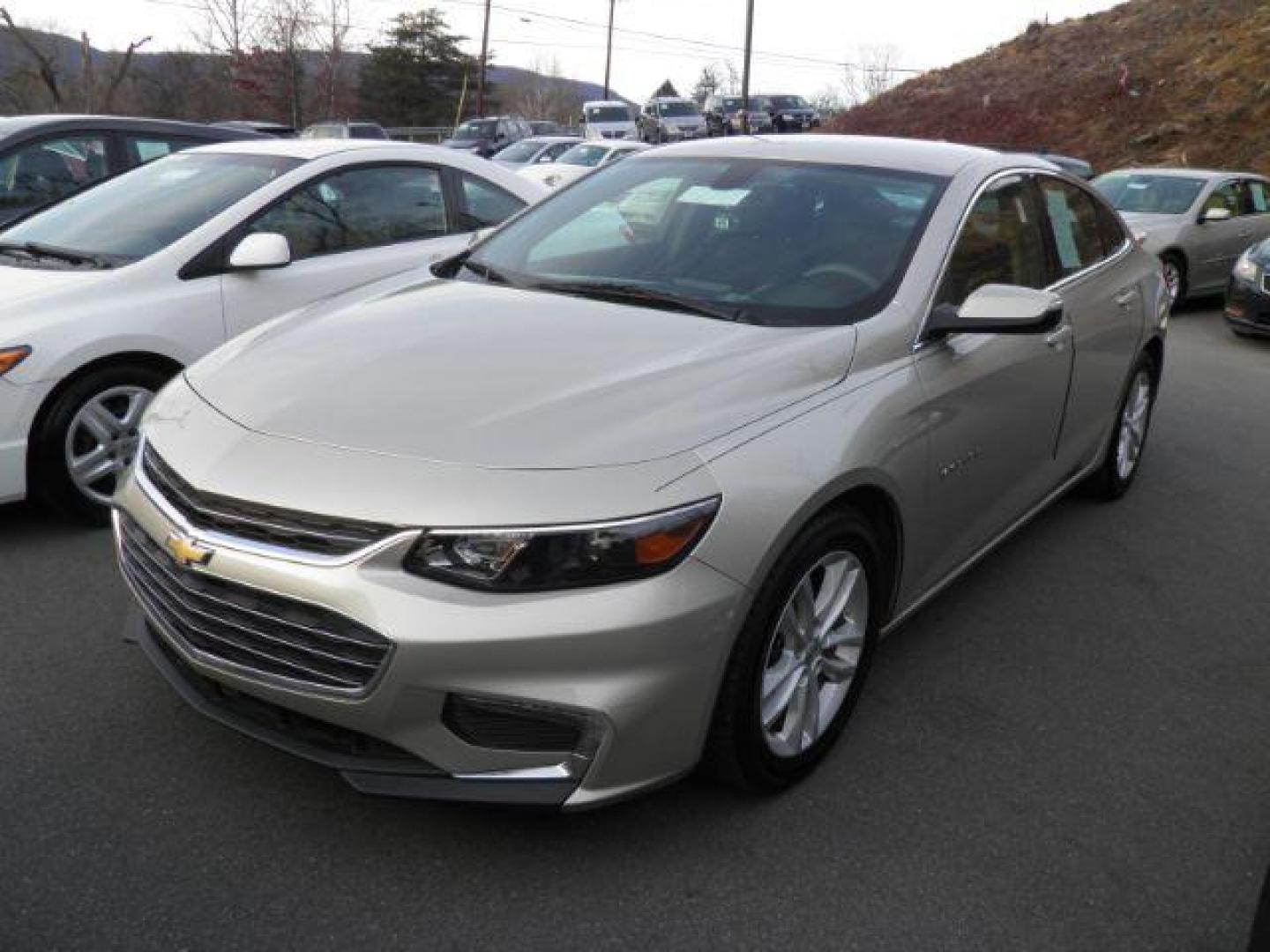 2016 TAN Chevrolet Malibu 1LT (1G1ZE5ST2GF) with an 1.5L L4 engine, AT transmission, located at 15520 McMullen Hwy SW, Belair, MD, 21502, (301) 729-3700, 39.581375, -78.846451 - Photo#0