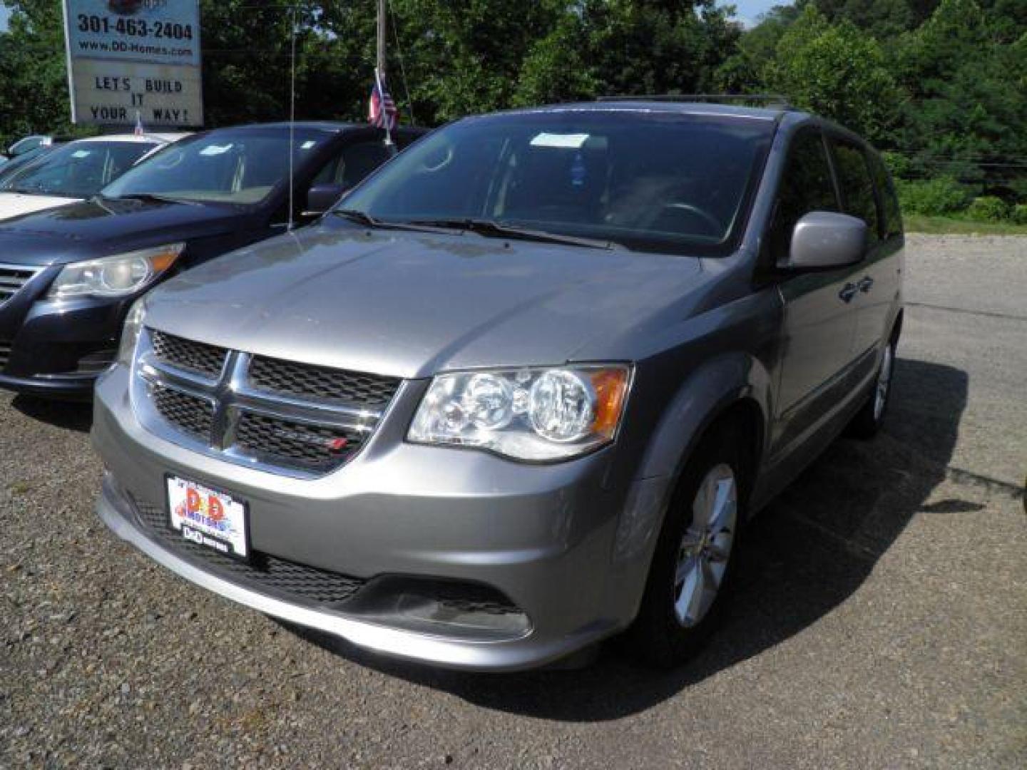 2016 SILVER Dodge Grand Caravan SXT (2C4RDGCG3GR) with an 3.5L V6 engine, AT transmission, located at 19521 New George's Creek Rd SW, Barton, MD, 21521, (301) 463-2404, 39.524323, -79.017906 - Photo#0