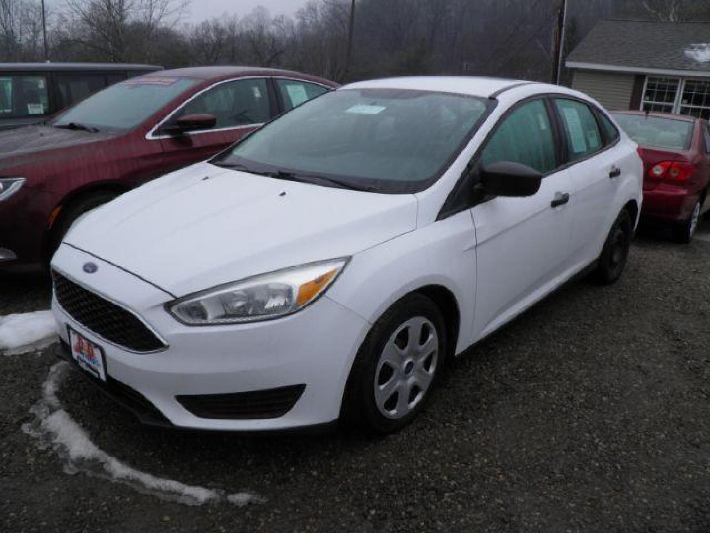 2016 WHITE Ford Focus S Sedan (1FADP3E24GL) with an 2.0L L4 engine, AT transmission, located at 19521 New George's Creek Rd SW, Barton, MD, 21521, (301) 463-2404, 39.524323, -79.017906 - Photo#0