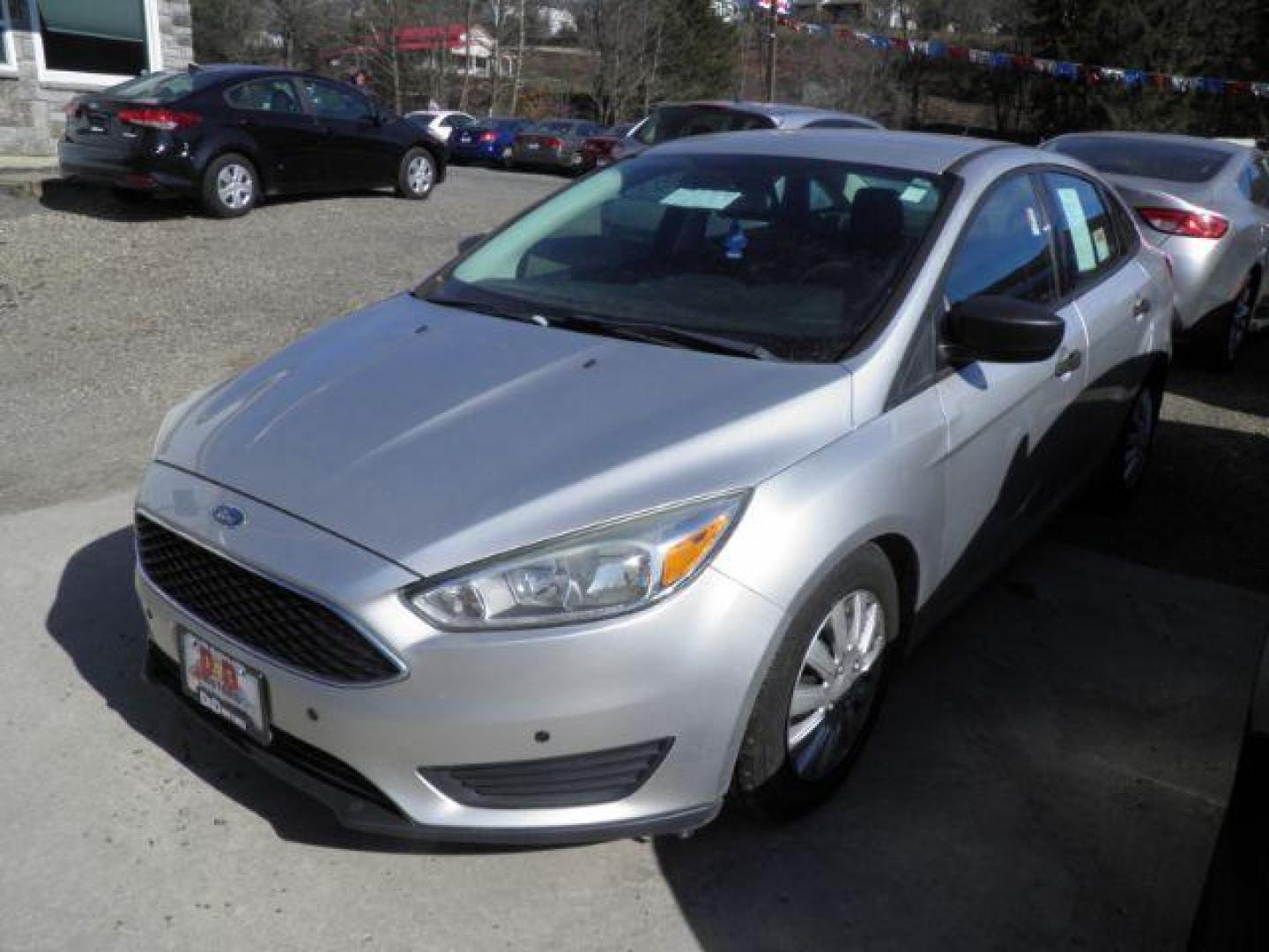 2016 SILVER Ford Focus S Sedan (1FADP3E2XGL) with an 2.0L L4 engine, AT transmission, located at 19521 New George's Creek Rd SW, Barton, MD, 21521, (301) 463-2404, 39.524323, -79.017906 - Photo#0