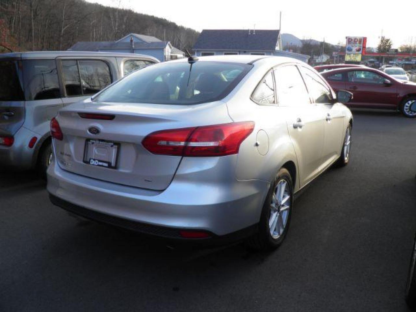 2016 SILVER FORD FOCUS SE Sedan (1FADP3F24GL) with an 2.0/ 4CLY engine, AT transmission, located at 15520 McMullen Hwy SW, Belair, MD, 21502, (301) 729-3700, 39.581375, -78.846451 - Photo#3