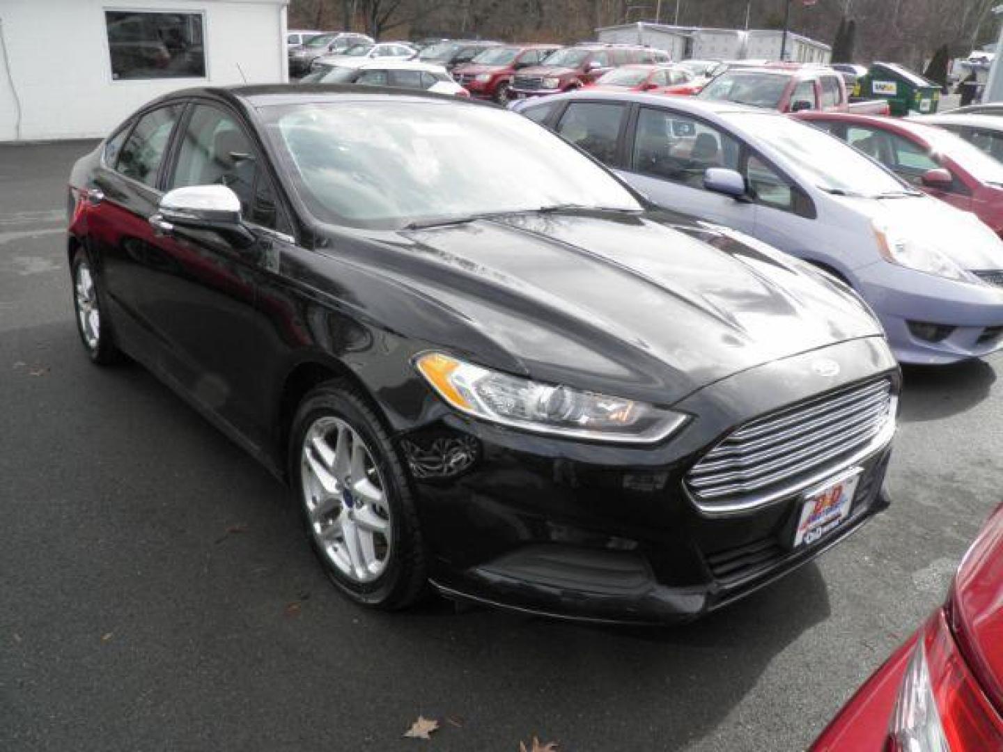 2016 BLACK Ford Fusion SE (1FA6P0H7XG5) with an 2.5 L4 engine, AT transmission, located at 19521 New George's Creek Rd SW, Barton, MD, 21521, (301) 463-2404, 39.524323, -79.017906 - Photo#0