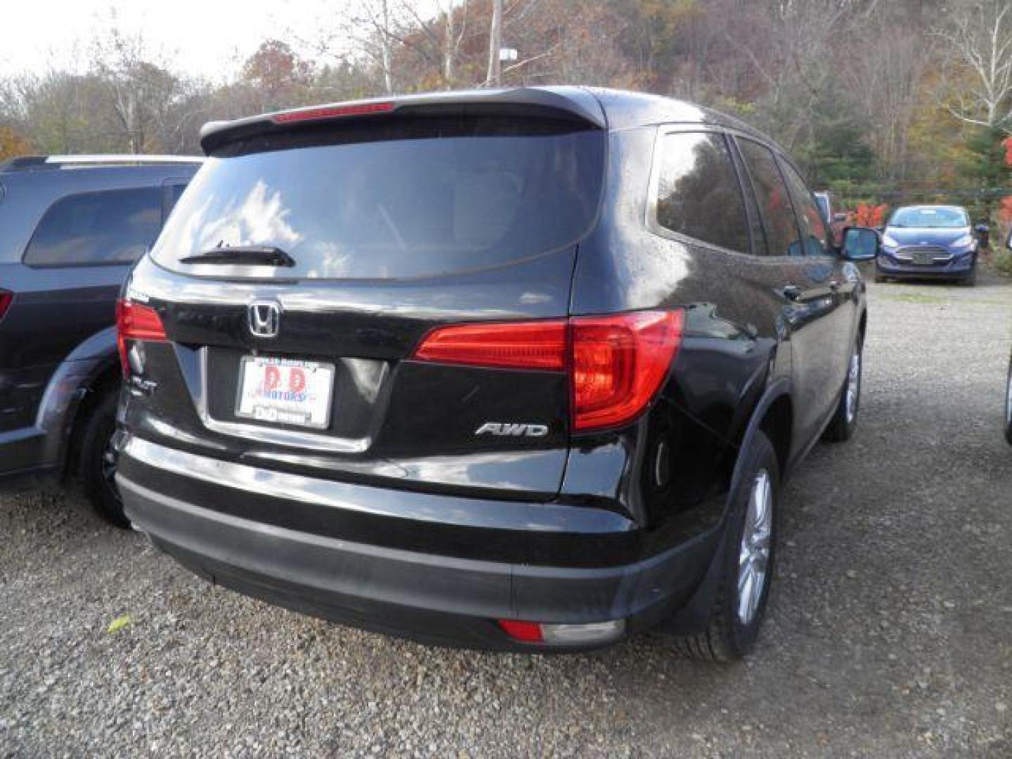 2016 BLACK Honda Pilot LX 4WD (5FNYF6H19GB) with an 3.5L V6 engine, AT transmission, located at 19521 New George's Creek Rd SW, Barton, MD, 21521, (301) 463-2404, 39.524323, -79.017906 - Photo#6