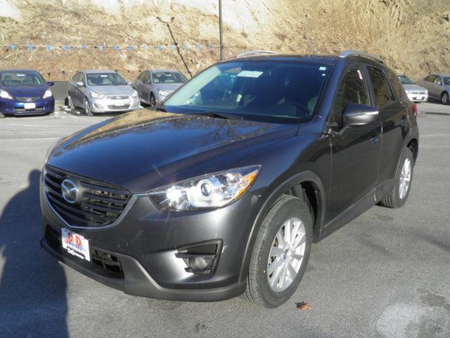 2016 GRAY Mazda CX-5 Touring AWD (JM3KE4CY2G0) with an 2.5 L4 engine, AT transmission, located at 15520 McMullen Hwy SW, Belair, MD, 21502, (301) 729-3700, 39.581375, -78.846451 - Photo#0