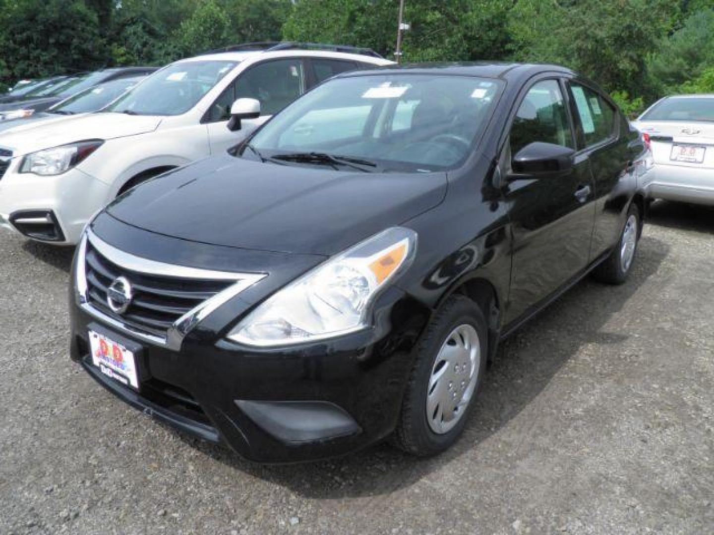 2016 BLACK Nissan Versa 1.6 S 5M (3N1CN7AP4GL) with an 1.6L L4 engine, 5SP transmission, located at 19521 New George's Creek Rd SW, Barton, MD, 21521, (301) 463-2404, 39.524323, -79.017906 - Photo#0