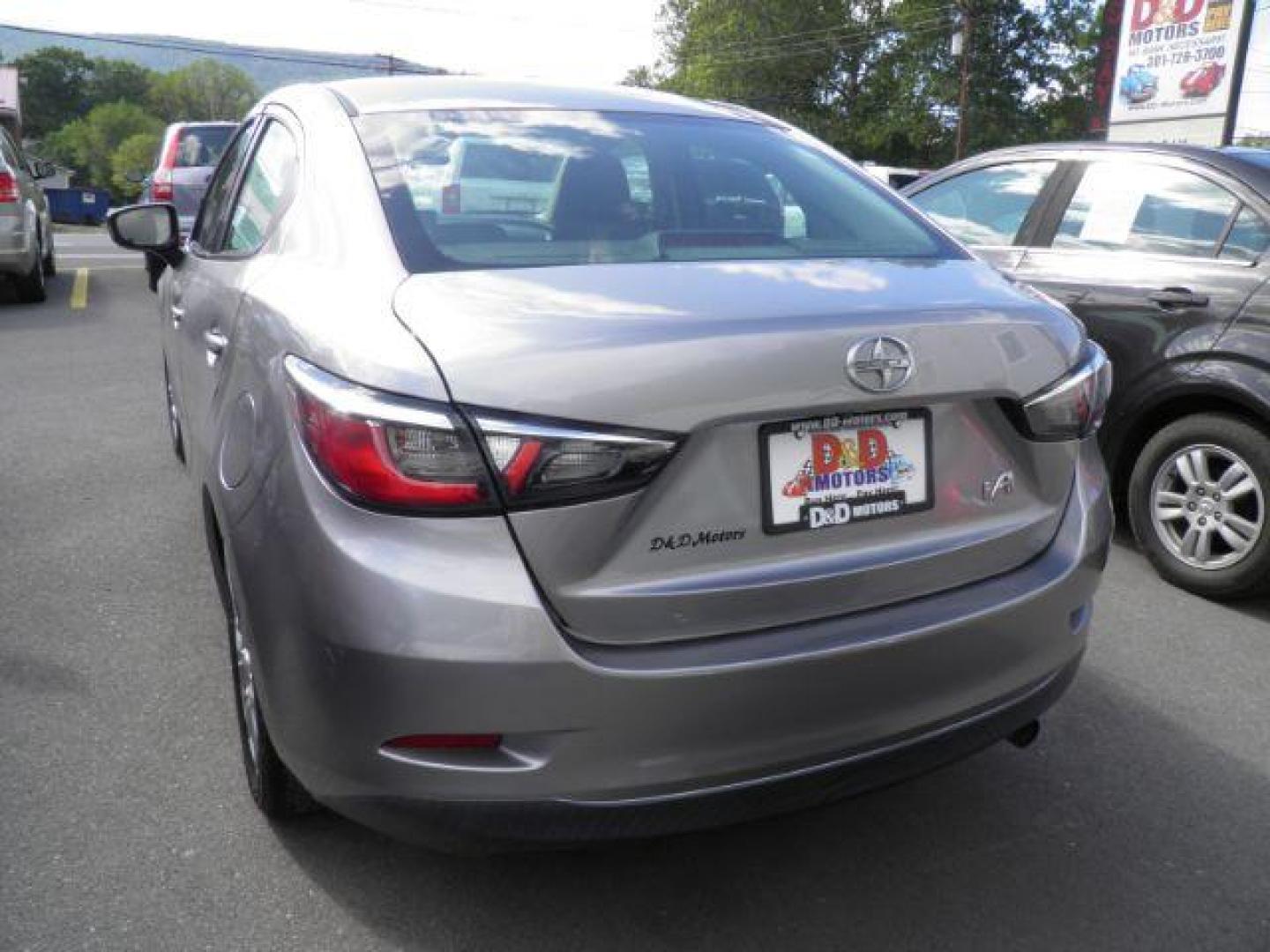 2016 GRAY SCION IA 6A (3MYDLBZV0GY) with an 1.5l L4 engine, MAN transmission, located at 15520 McMullen Hwy SW, Belair, MD, 21502, (301) 729-3700, 39.581375, -78.846451 - Photo#4