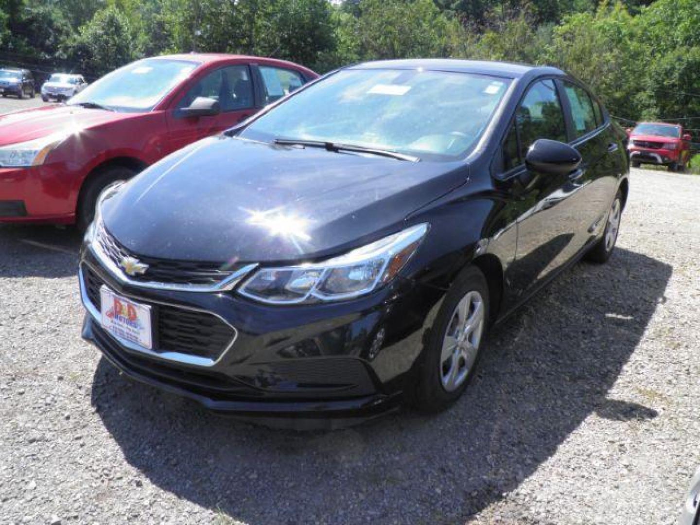 2017 BLACK Chevrolet Cruze LS Auto (1G1BC5SM7H7) with an 1.4L 4L engine, AT transmission, located at 19521 New George's Creek Rd SW, Barton, MD, 21521, (301) 463-2404, 39.524323, -79.017906 - Photo#0