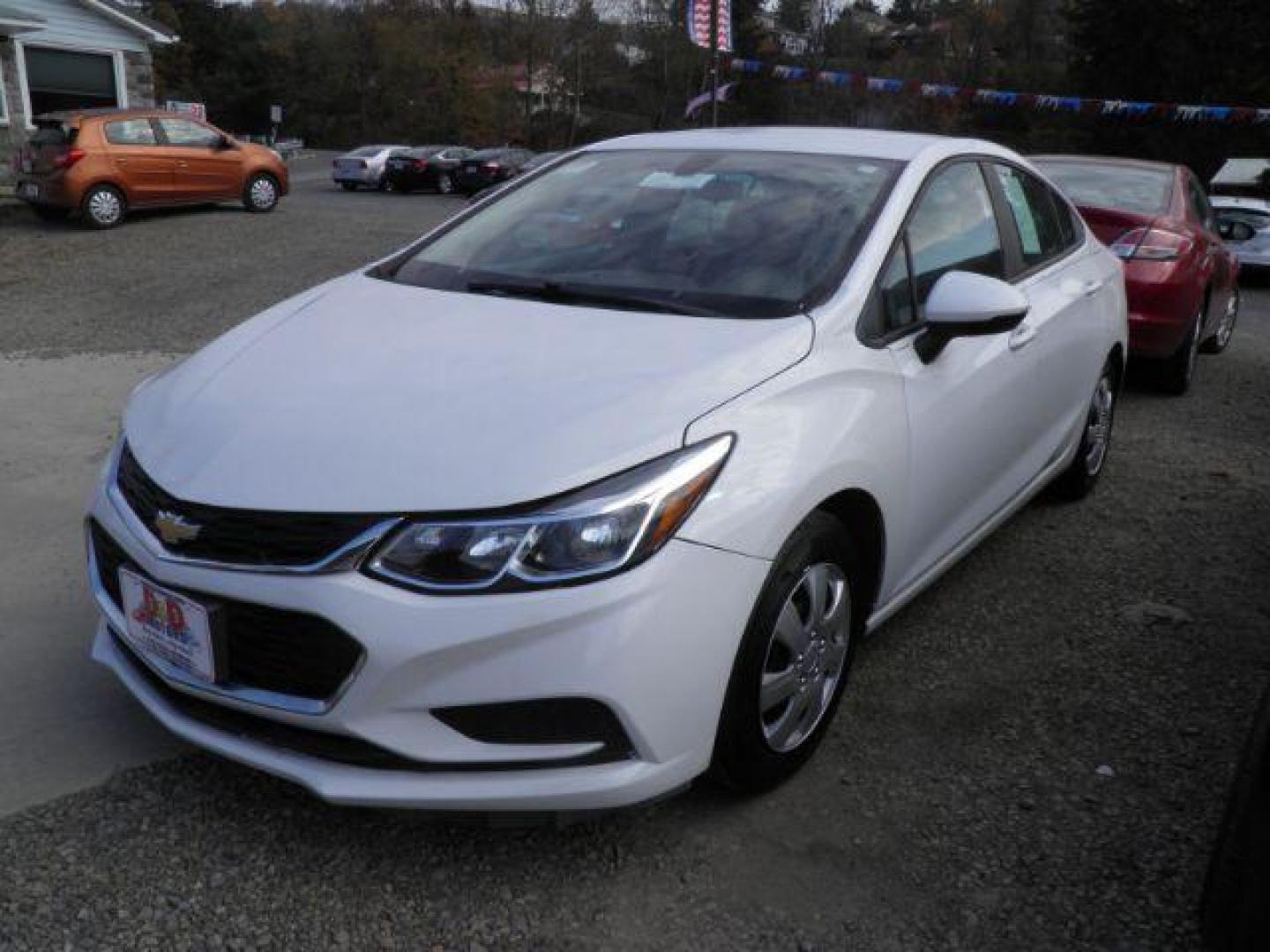 2017 WHITE Chevrolet Cruze LS Auto (1G1BC5SM8H7) with an 1.4L 4L engine, AT transmission, located at 19521 New George's Creek Rd SW, Barton, MD, 21521, (301) 463-2404, 39.524323, -79.017906 - Photo#0