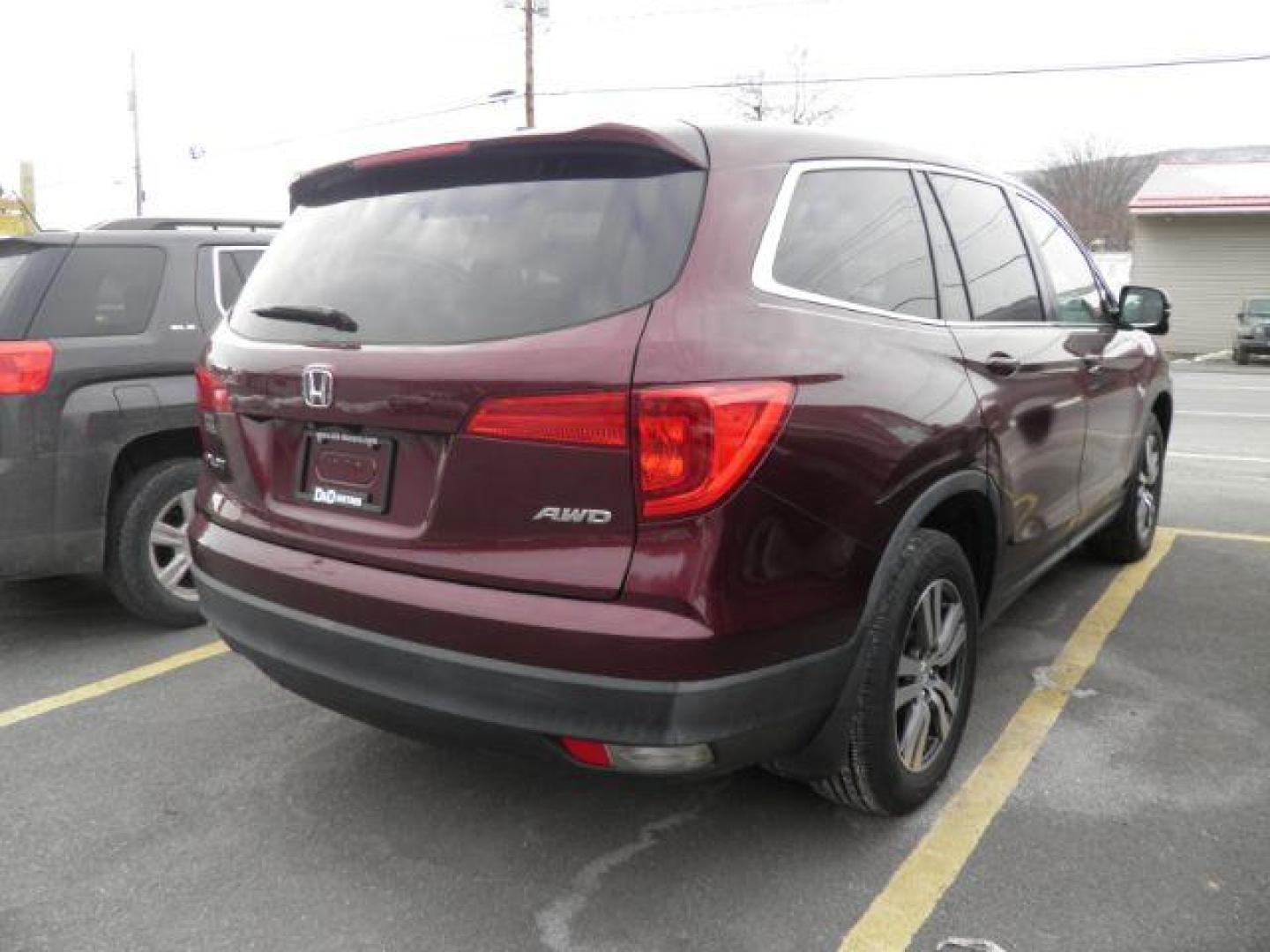 2017 MAROON HONDA PILOT EXL 4WD (5FNYF6H54HB) with an 3.5L V6 engine, AT transmission, located at 19521 New George's Creek Rd SW, Barton, MD, 21521, (301) 463-2404, 39.524323, -79.017906 - Photo#5