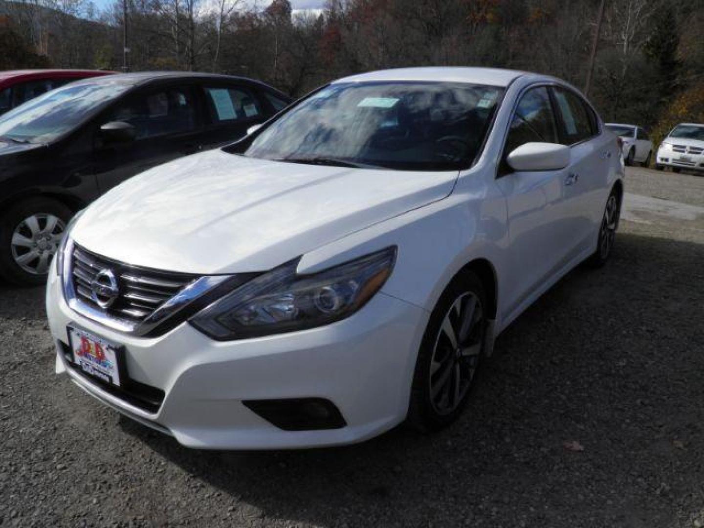 2017 WHITE Nissan Altima 2.5 SR (1N4AL3AP9HC) with an 2.5 L4 engine, CVT transmission, located at 19521 New George's Creek Rd SW, Barton, MD, 21521, (301) 463-2404, 39.524323, -79.017906 - Photo#0