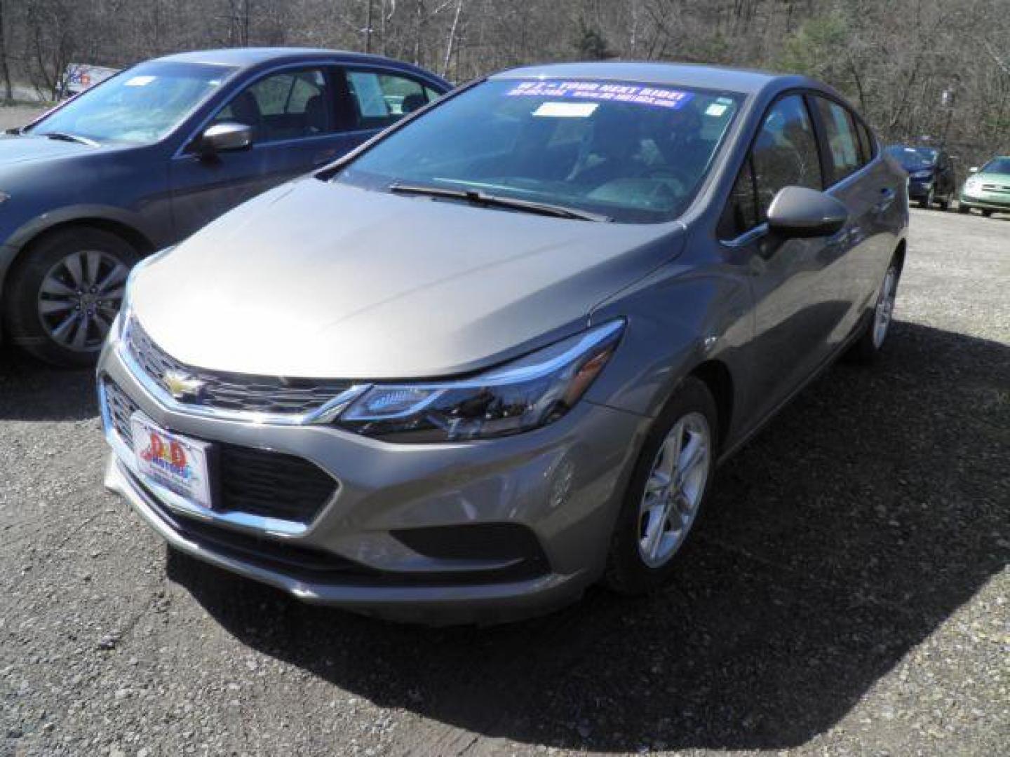 2018 GRAY Chevrolet Cruze LT Auto (1G1BE5SM3J7) with an 1.4l L4 engine, AT transmission, located at 19521 New George's Creek Rd SW, Barton, MD, 21521, (301) 463-2404, 39.524323, -79.017906 - Photo#0