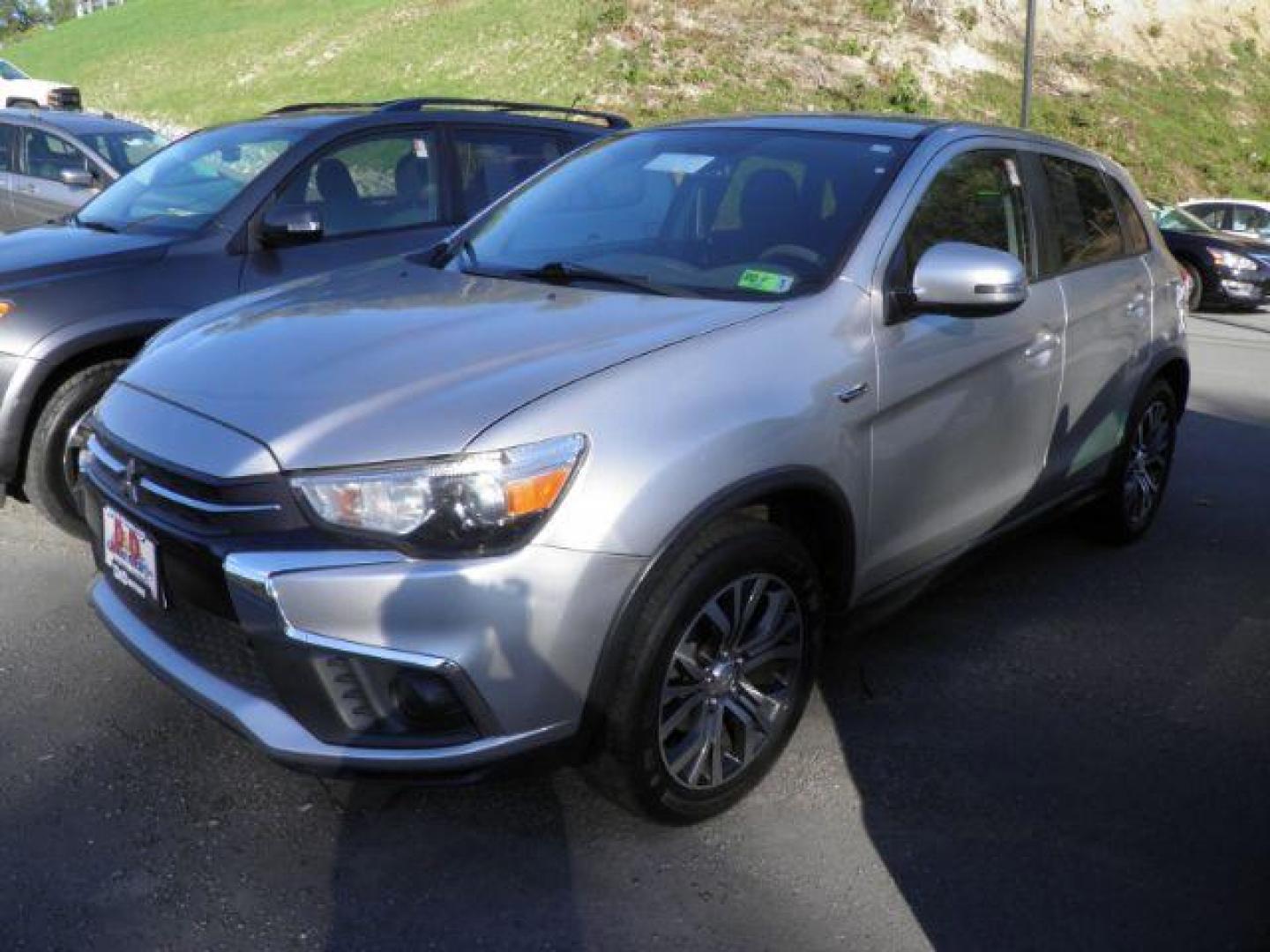 2018 SILVER Mitsubishi Outlander Sport SUV (JA4AP3AU3JU) with an 2.0l L4 engine, AT transmission, located at 19521 New George's Creek Rd SW, Barton, MD, 21521, (301) 463-2404, 39.524323, -79.017906 - Photo#0