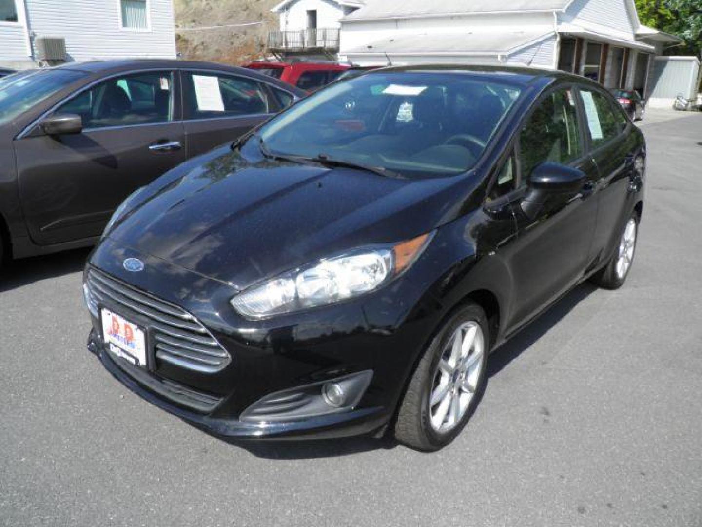 2019 BLACK Ford Fiesta SE Sedan (3FADP4BJ1KM) with an 1.6L L4 engine, AT transmission, located at 19521 New George's Creek Rd SW, Barton, MD, 21521, (301) 463-2404, 39.524323, -79.017906 - Photo#0