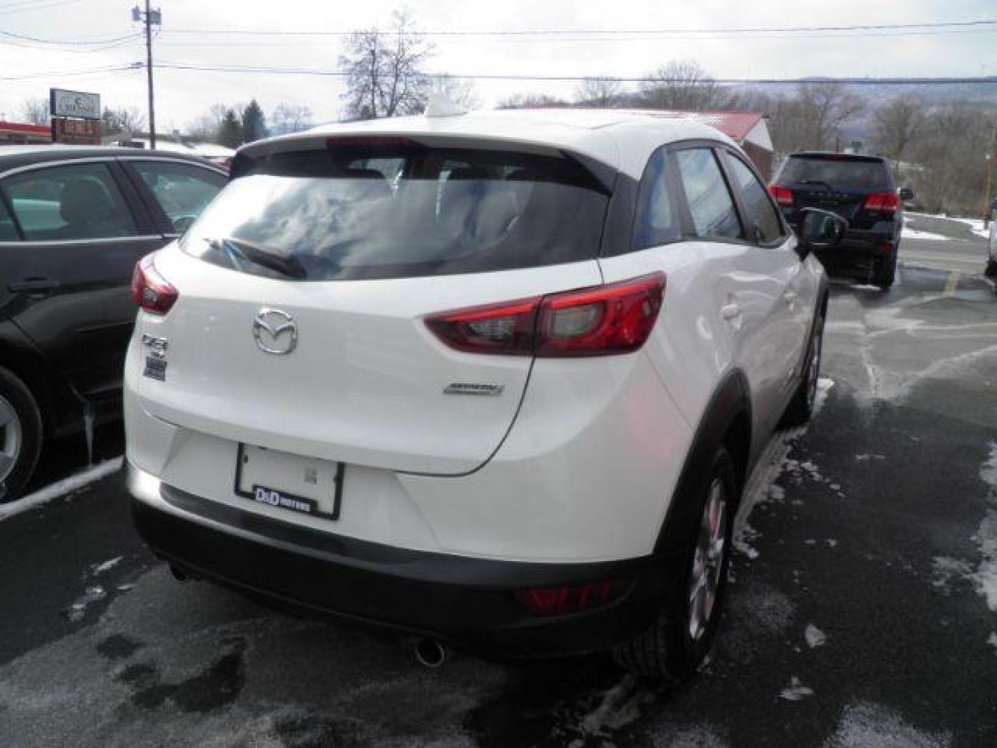 2019 WHITE MAZDA CX-3 Spt (JM1DKFB75K0) with an 2.0L L4 engine, AT transmission, located at 15520 McMullen Hwy SW, Belair, MD, 21502, (301) 729-3700, 39.581375, -78.846451 - Photo#5